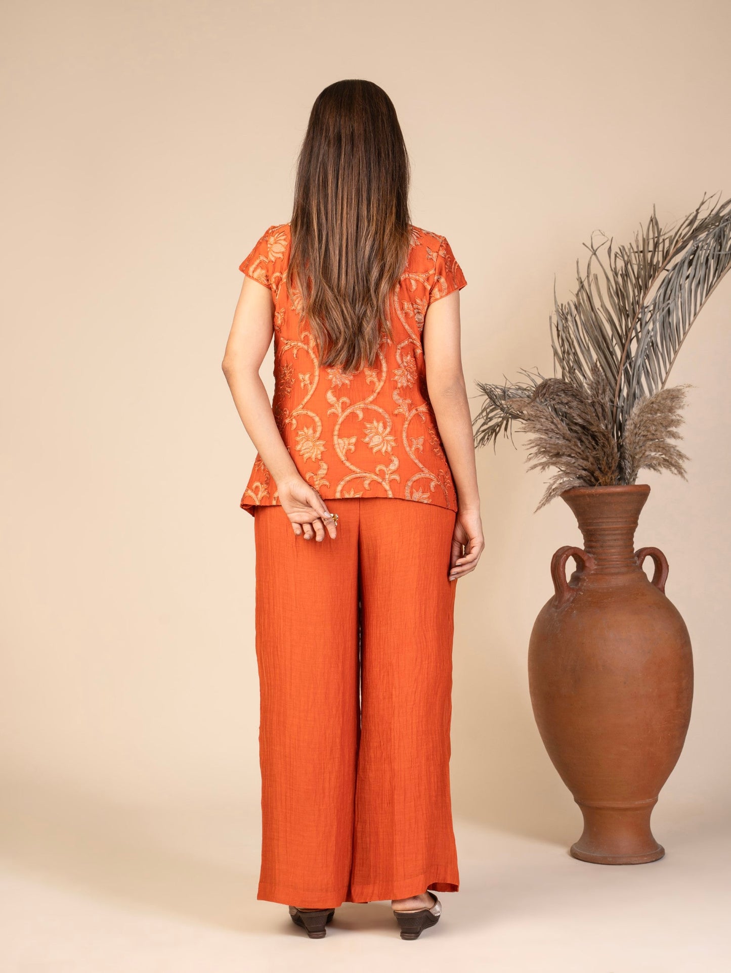 A Cap-Sleeve Overlap Top with Floral Applique and Wide-Leg Pants Co-ord Set
