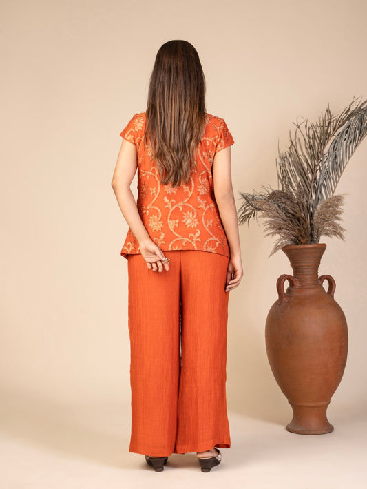 A Cap-Sleeve Overlap Top with Floral Applique and Wide-Leg Pants Co-ord Set